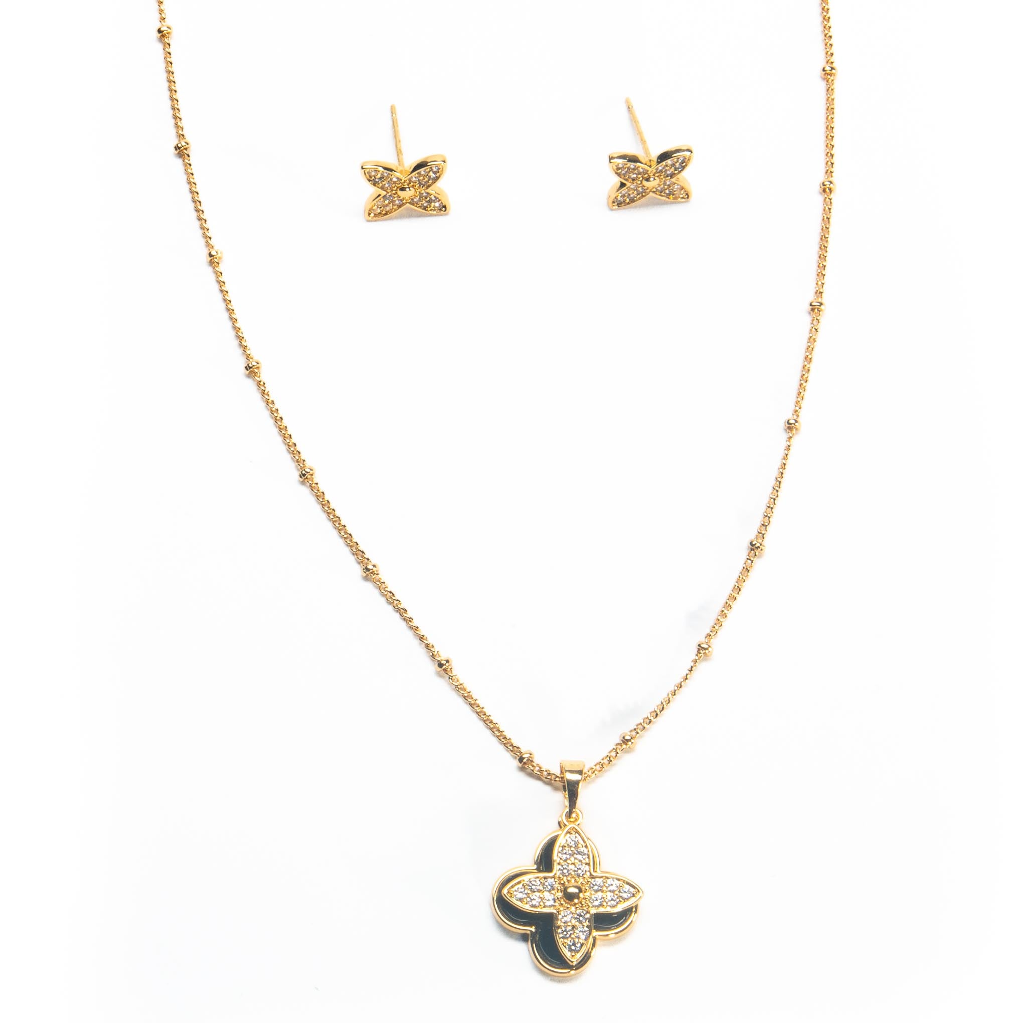 Collar y aretes dorado flor con zirconias blancas 
